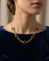 Gold Tone Flat Woven Chain Necklace with Oval Green Cabochon Stones